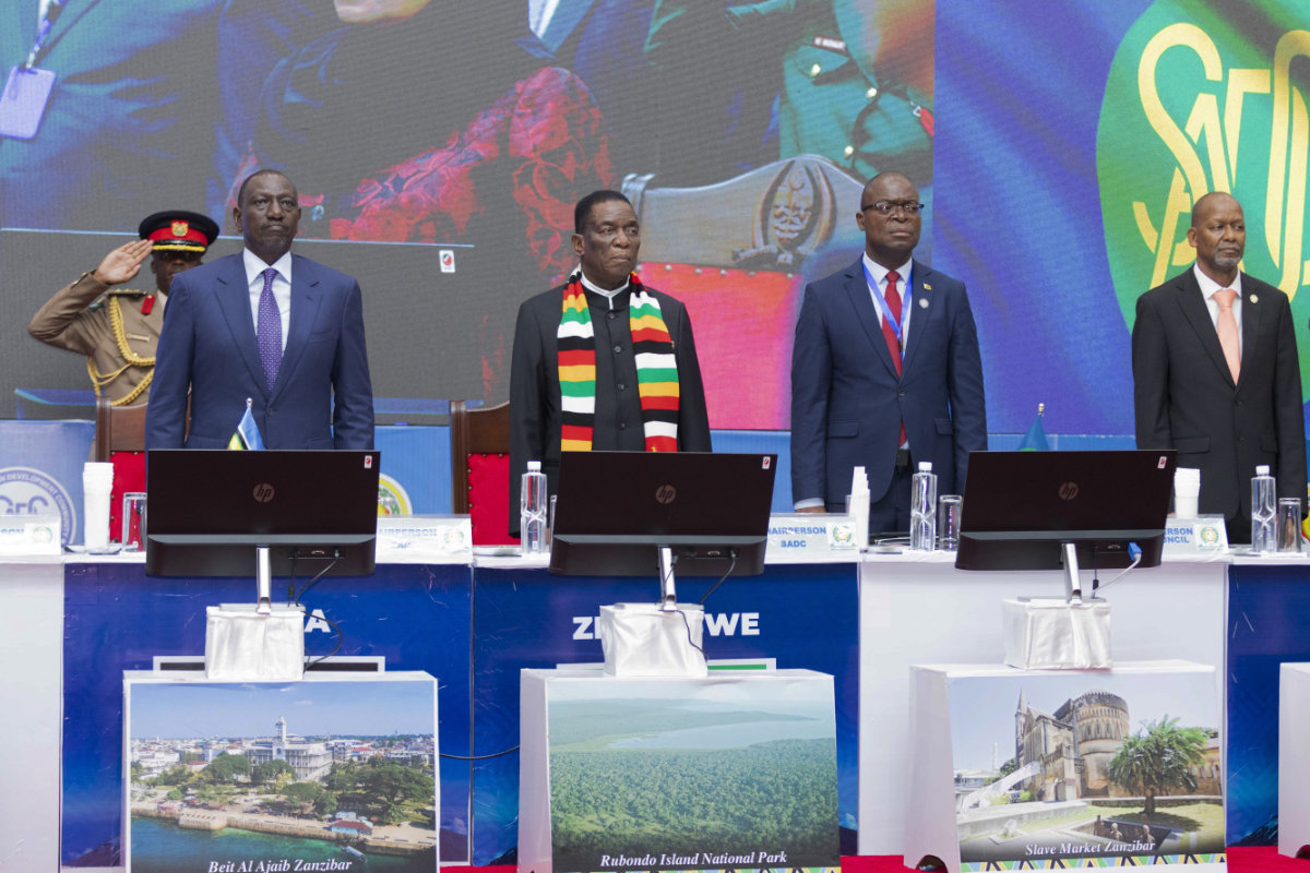 Kenyan President and East African Community (EAC) Chairman William Ruto, left, and Zimbabwe President and Southern African Development Community (SADC) Chairman Emmerson Mnangagwa, center left, attend a joint summit to address conflict in Eastern Democratic Republic of Congo in Dar es Salaam, Tanzania, on Feb. 8, 2025. (AP Photo)