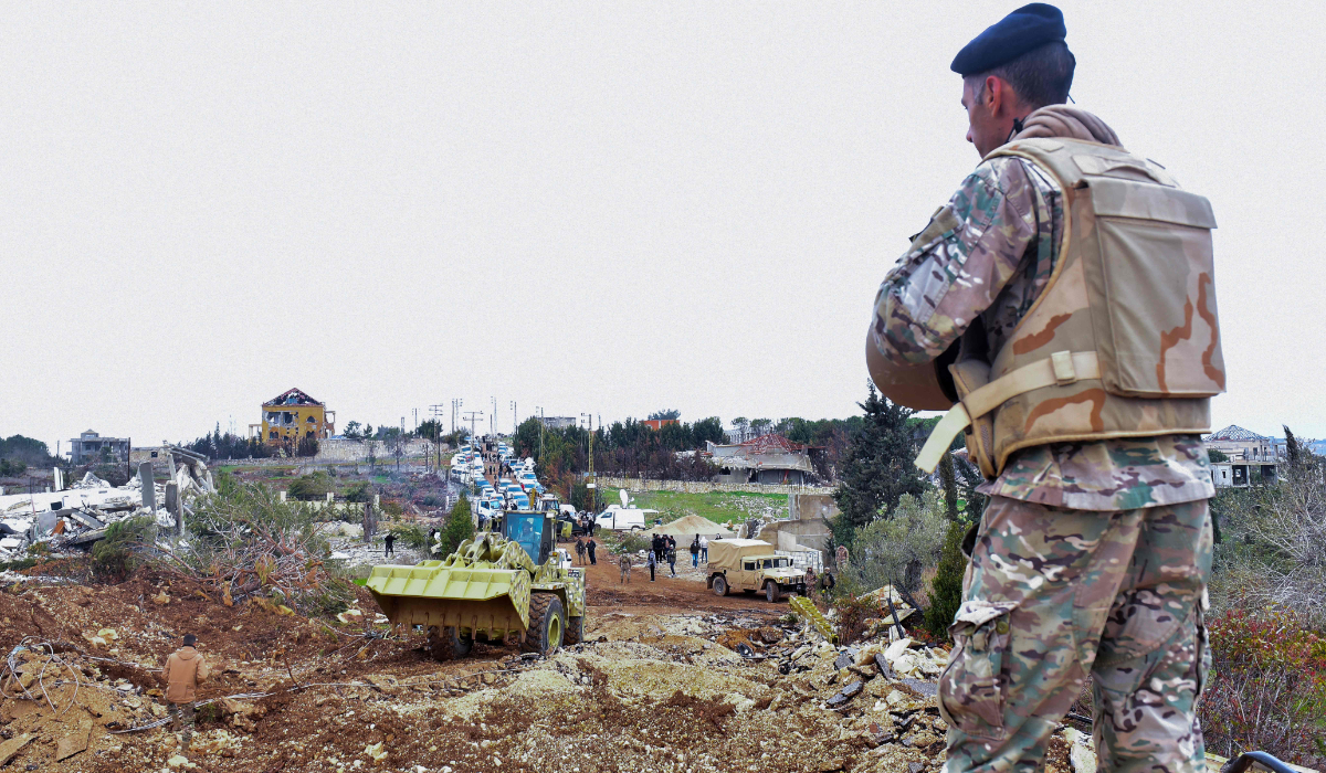 Residents of the southern Lebanese village of Rabb Thlathin inspect their devastated neighbourhoods as they return to town following army deployment on February 9, 2025. (AFP)