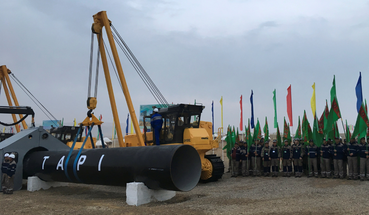 Workers attend the launching ceremony of construction work of the TAPI project on the Afghan section of a natural gas pipeline that will link Turkmenistan through Afghanistan to Pakistan and India, near the town of Serhetabat, Turkmenistan February 23, 2018. (REUTERS)