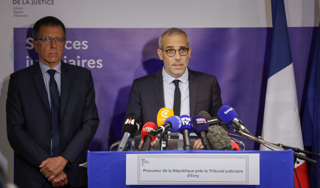 Evry public prosecutor Gregoire Dulin (R) holds a press conference on the murder case of 11-year-old schoolgirl Louise, in Evry, south of Paris, on February 12, 2025. (AFP)