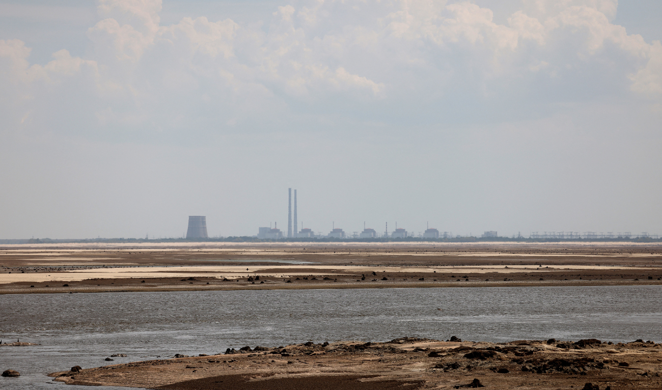 This photograph taken from Ukrainian city of Nikopol on July 7, 2023, shows the Zaporizhzhia nuclear power plant. (AFP/File)