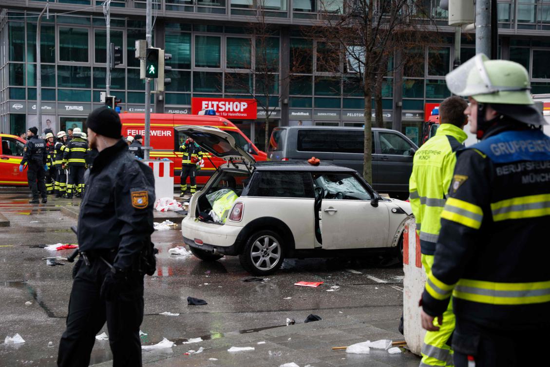 Members of the emergency services work at the scene where a car drove into a crowd in the southern German city of Munich on Feb. 13, 2025 leaving several people injured, police said. (AFP)