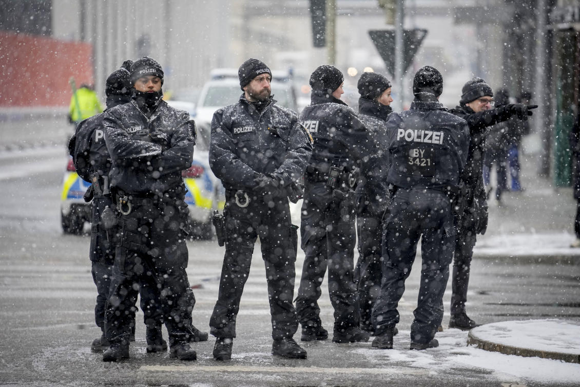 German police officers stand at the site where a car crashed into a Ver.di demonstration the day before, Munich, Germany, Friday, Feb. 14, 2025. (AP)