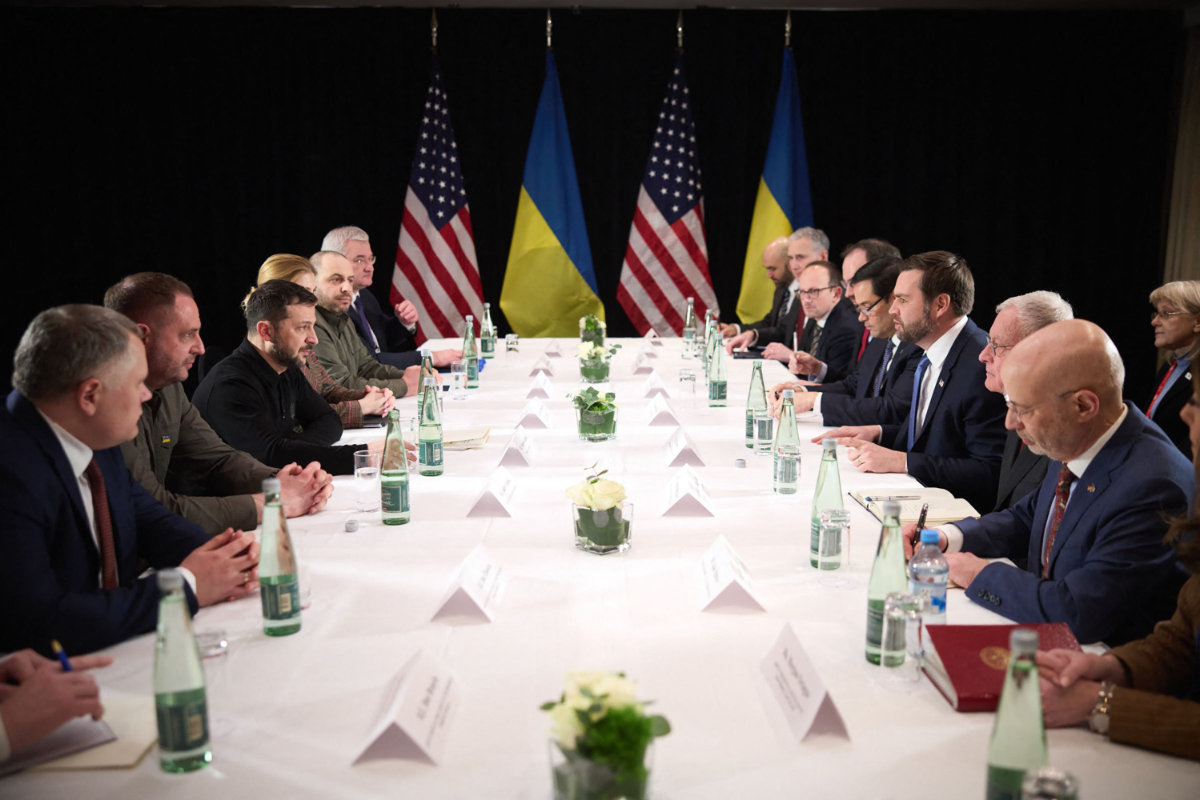 Ukrainian President Volodymyr Zelensky (3L) and US Vice President JD Vance (3R) meet on the sidelines of the Munich Security Conference in Germany on February 14, 2025. (Ukrainian Presidential Press Service handout photo/AFP)