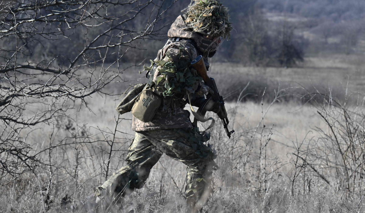 A serviceman of the Alkatraz special rifle battalion, former prisoner who volunteered to defend Ukraine, of the 93rd Motorized Brigade takes part in a military drill in an undisclosed location in the Donetsk region on February 13, 2025, amid the Russian invasion of Ukraine. (AFP)