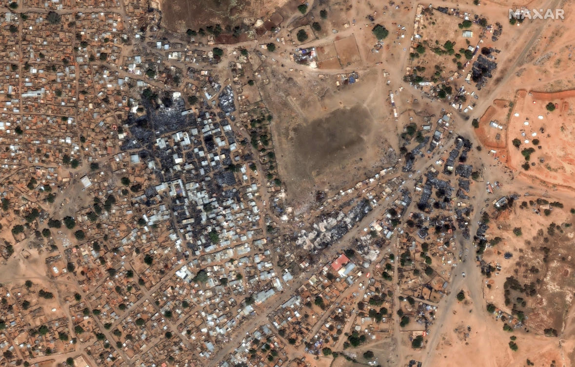General view of Zamzam refugee camp and market area after attacks, outside the Darfur town of Al-Fasher, Darfur region, Sudan, Thursday Feb. 13, 2025. (AP)