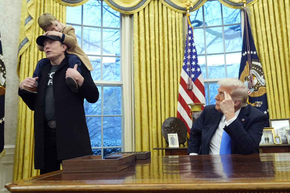 President Donald Trump speaks next to Elon Musk and X Æ A-Xii, Musk’s son, in the White House in Washington, D.C., on February 11, 2025. (REUTERS)