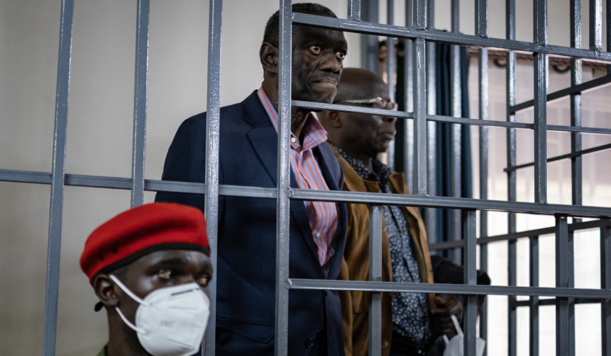 Uganda's veteran opposition figure Kizza Besigye stands in the dock at the Makindye Martial Court in Kampala, on November 20, 2024. (AFP)