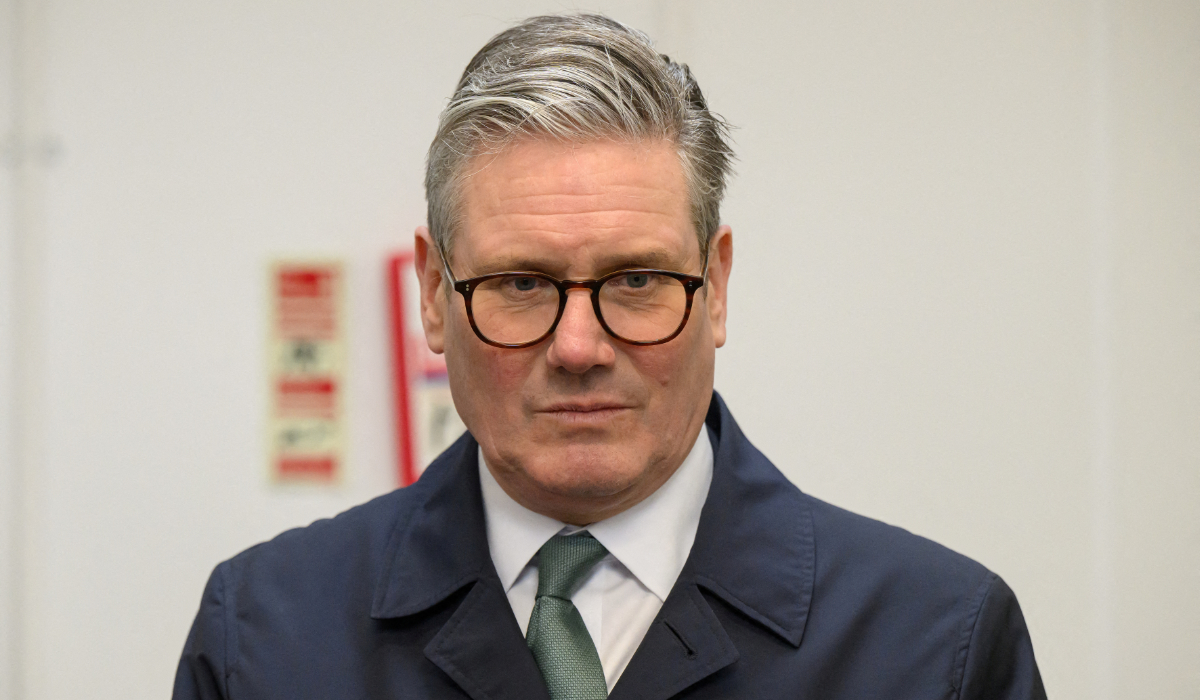 British Prime Minister Keir Starmer visits the community kitchen at the Newquay Orchard on February 10, 2025 in Newquay, Britain. (REUTERS)