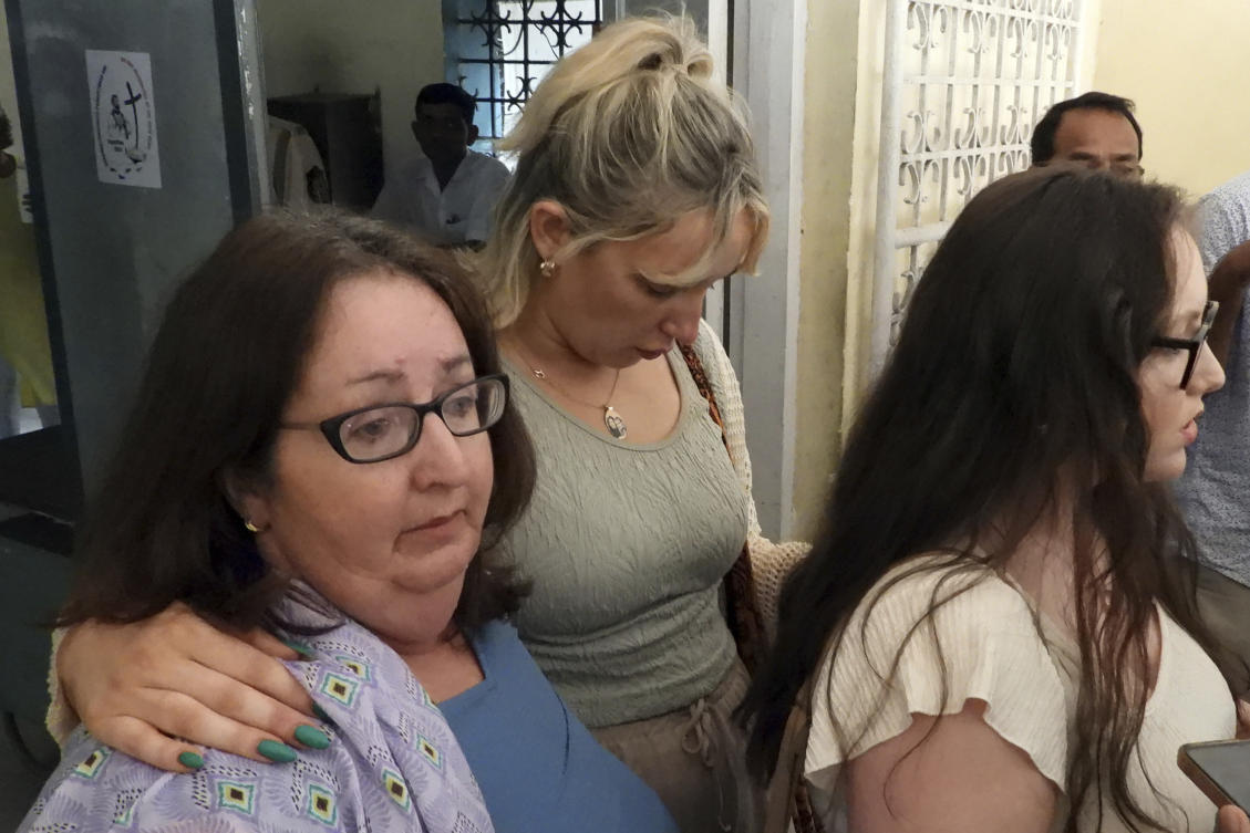 Above, family members of an Irish woman who was raped and murdered at a popular tourist resort in 2017 in Goa react after the court’s verdict on the case in Goa, India on Feb. 14, 2025. (AP)