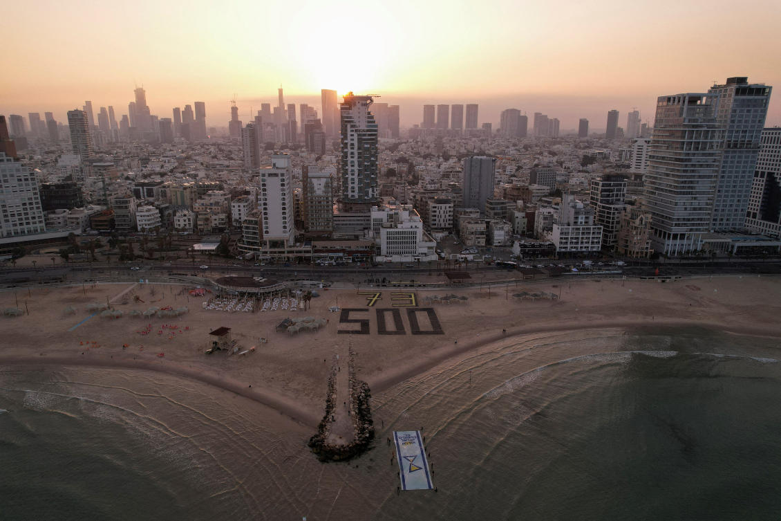 A drone view shows Israeli protesters display the numbers 500 and 73 as part of an installation to mark the 500 days (REUTERS)