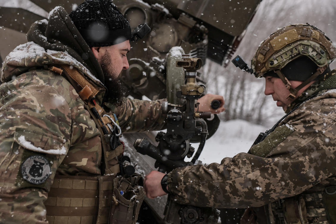 Ukranian servicemen prepare to fire a BM-21 Grad multiple-launch rocket system toward Russian troops near the town of Chasiv Yar in Donetsk region on Feb. 15, 2025. (Ukrainian Armed Forces handout via Reuters)