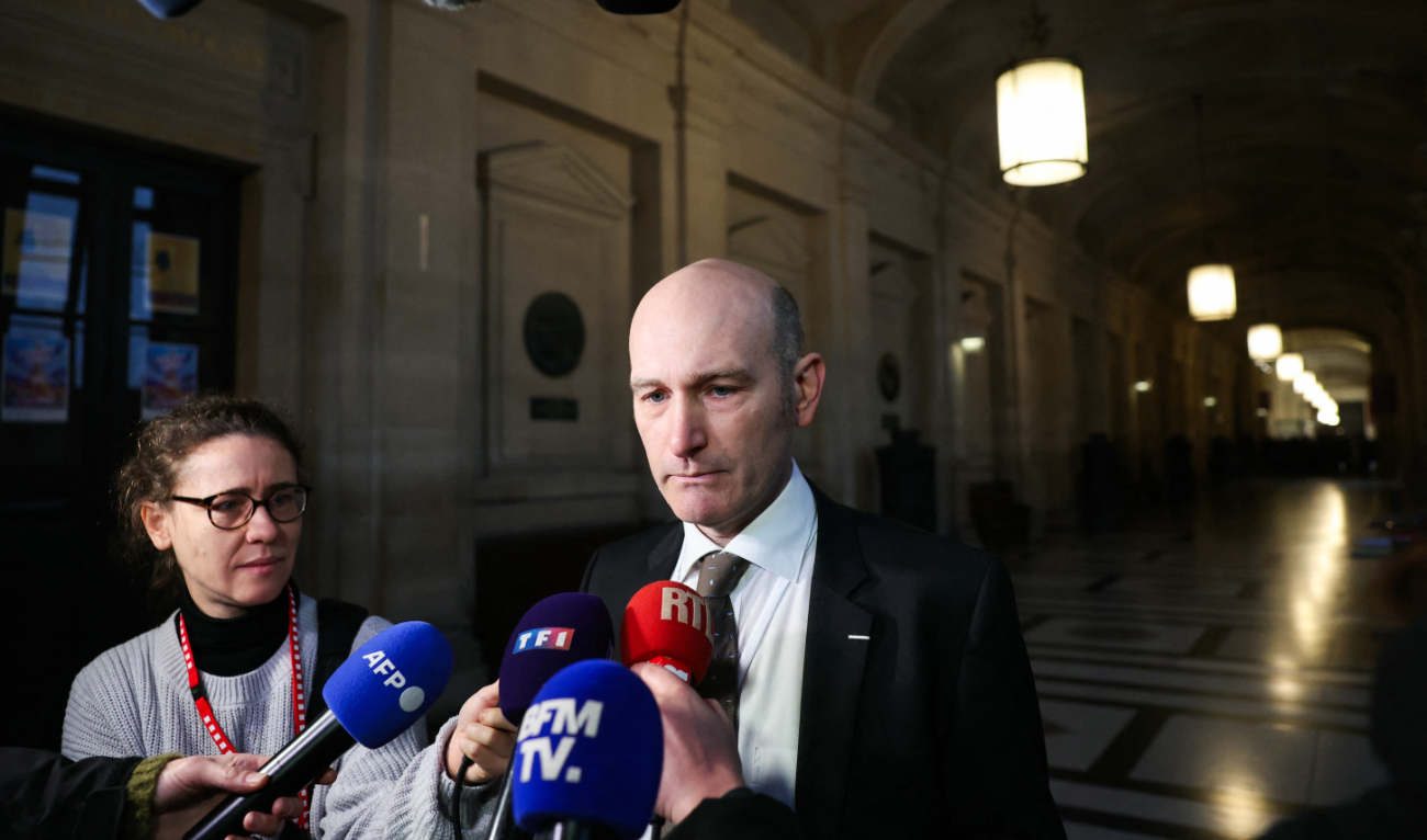 French journalist and former hostage in Syria Nicolas Henin speaks to the press as he arrives on the first day of the trial of Mehdi Nemmouche for holding French journalists under Daesh in Syria in 2013, at the Special Assize Court of Paris on February 17, 2025. (AFP)