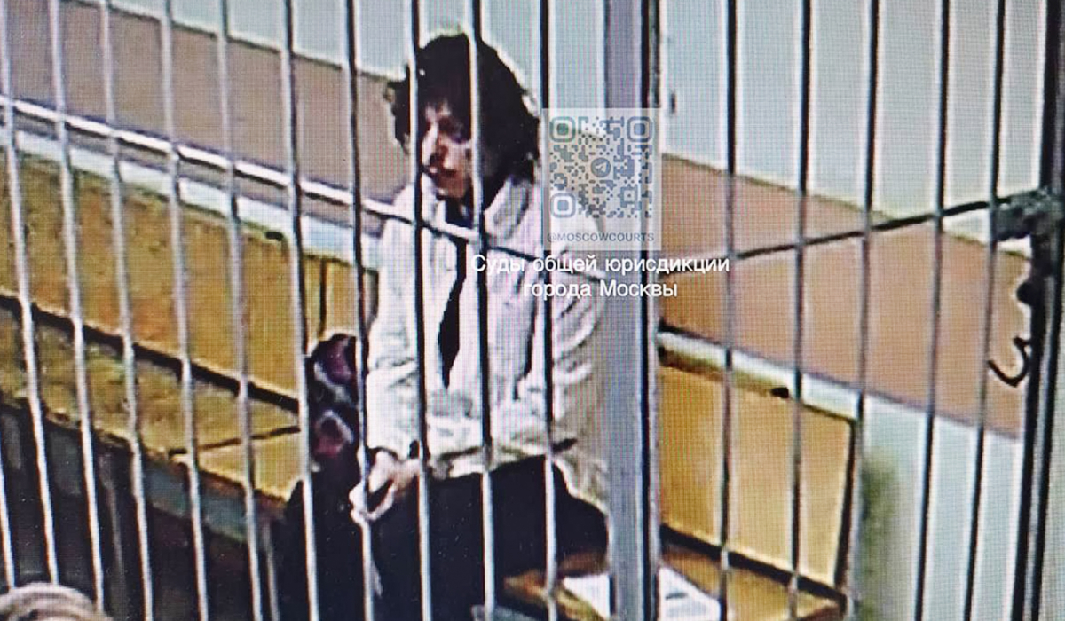A U.S. citizen, whom the statement named as Kalob Wayne Byers, who was detained after airport customs officials found cannabis-laced marmalade in his baggage on Friday sits in a cage during a court session in the Moscow City court, in Moscow, Russia, Monday, Oct. 7, 2024. (AP)