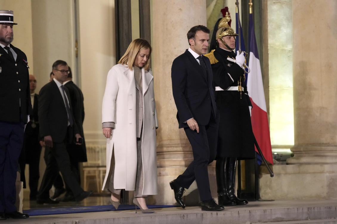 French President Emmanuel Macron, center right, walks with Italy's Prime Minister Giorgia Meloni, center left, as she leaves the Elysee Palace, after an informal meeting of leaders from key European Union nations and the United Kingdom, in Paris, Monday, Feb. 17, 2025. (AP)
