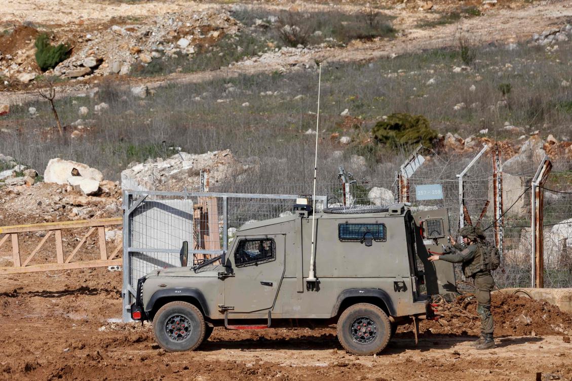 An Israeli military vehicle deploys on the Israel-Lebanon border on Feb. 17, 2025. Israeli troops are still present in a handful of villages and towns in southeast Lebanon. (AFP)