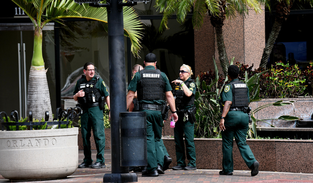 Police officers patrol around Orange Av., where a shooting occurred during Halloween festivities on November 01, 2024 in Orlando, Florida. (AFP)