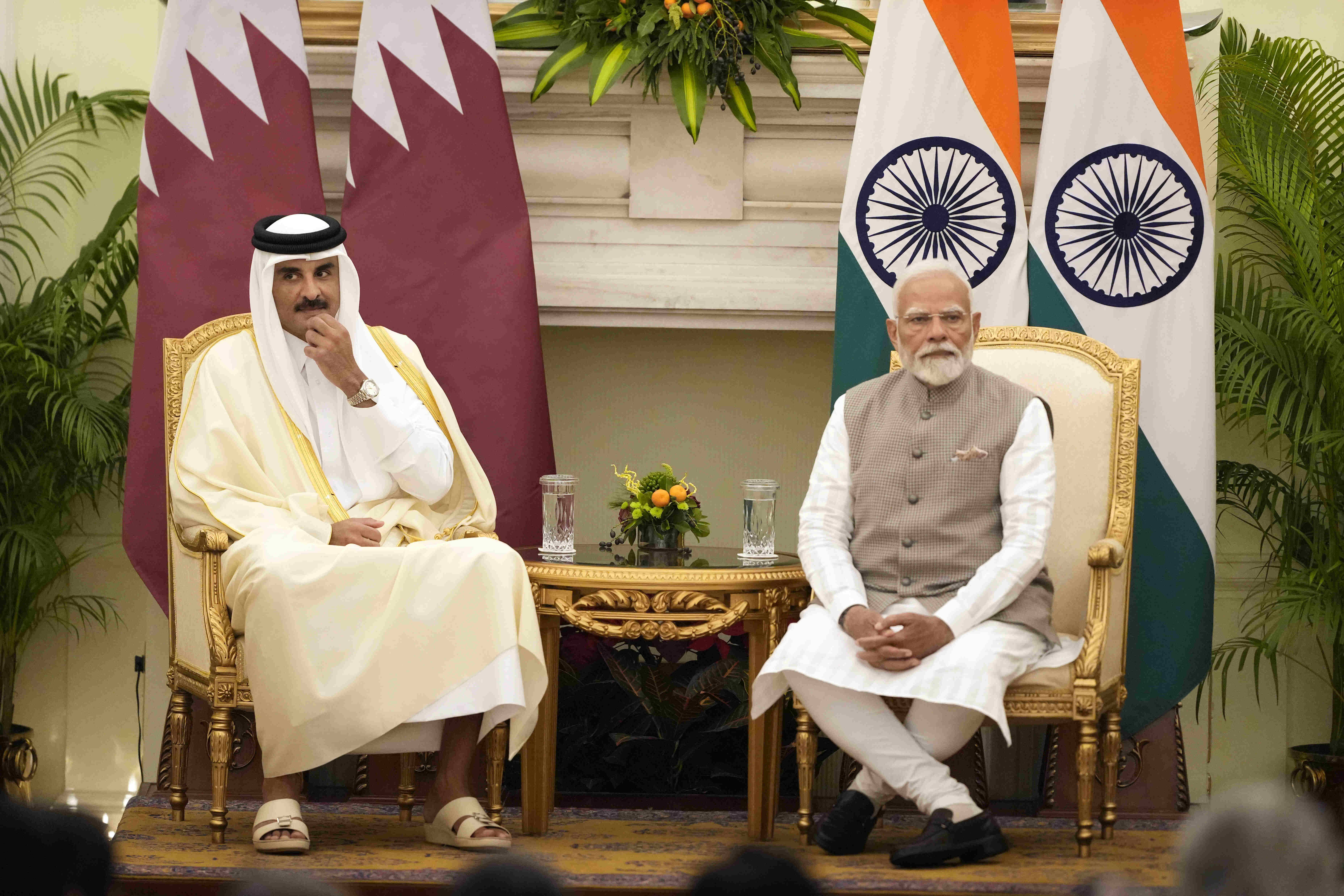 Qatar's Emir Sheikh Tamim bin Hamad Al-Thani and Indian Prime Minister Narendra Modi, right, preside over signing of agreements in New Delhi, India (AP Photo/Manish Swarup)