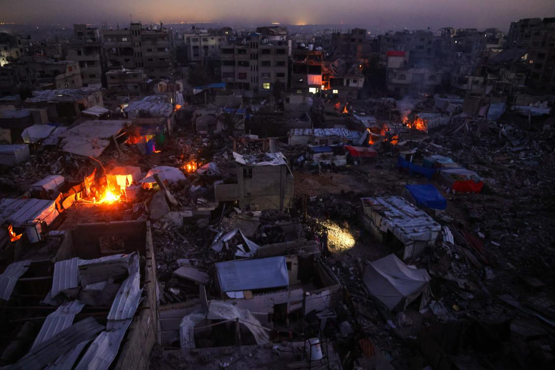 Palestinians camp amid the ruins of their houses in Jabalia in the northern Gaza Strip on Feb. 17, 2025. (AFP)