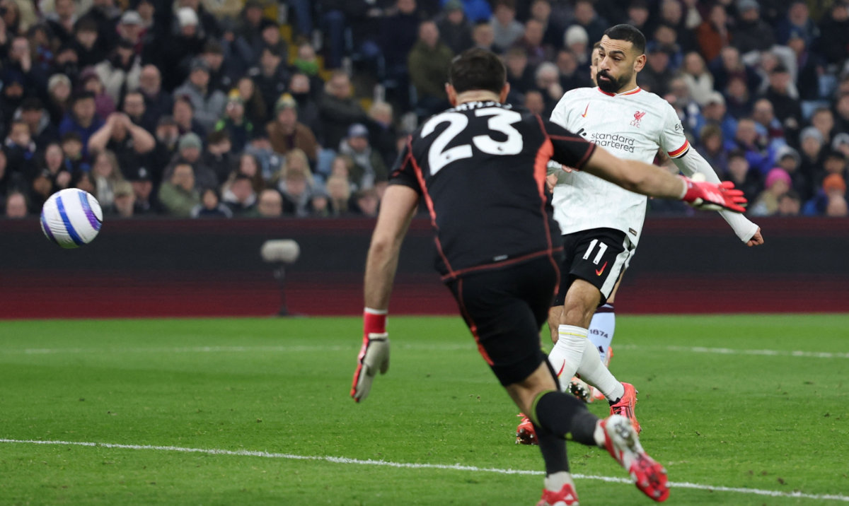 Liverpool’s Mohamed Salah scores their first goal during the Premier League match against Aston Villa at Villa Park, Birmingham, Britain, on Feb. 19, 2025. (Reuters)