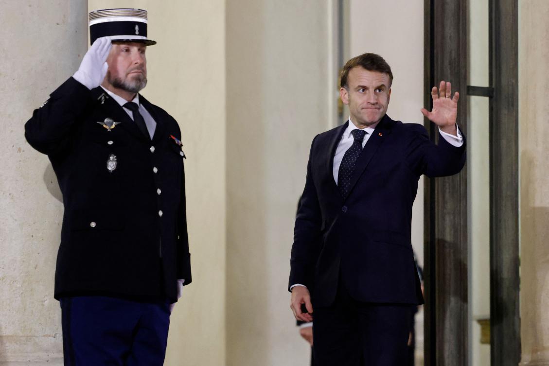 French President Emmanuel Macron waves after an informal summit of European leaders to discuss the situation in Ukraine and European security at the Elysee Palace in Paris on February 17, 2025. (AFP)