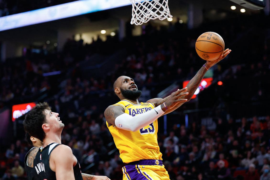 Los Angeles Lakers coach JJ Redick praised LeBron James for his approach in building a partnership with Luka Doncic. (Getty Images via AFP)