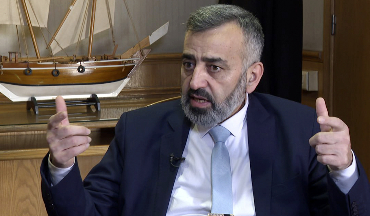Hassan al-Daghim, spokesperson for the preparatory committee for Syria's national dialogue conference, speaks during an interview with The Associated Press in Damascus, Syria, Friday, Feb. 21, 2025. (AP)