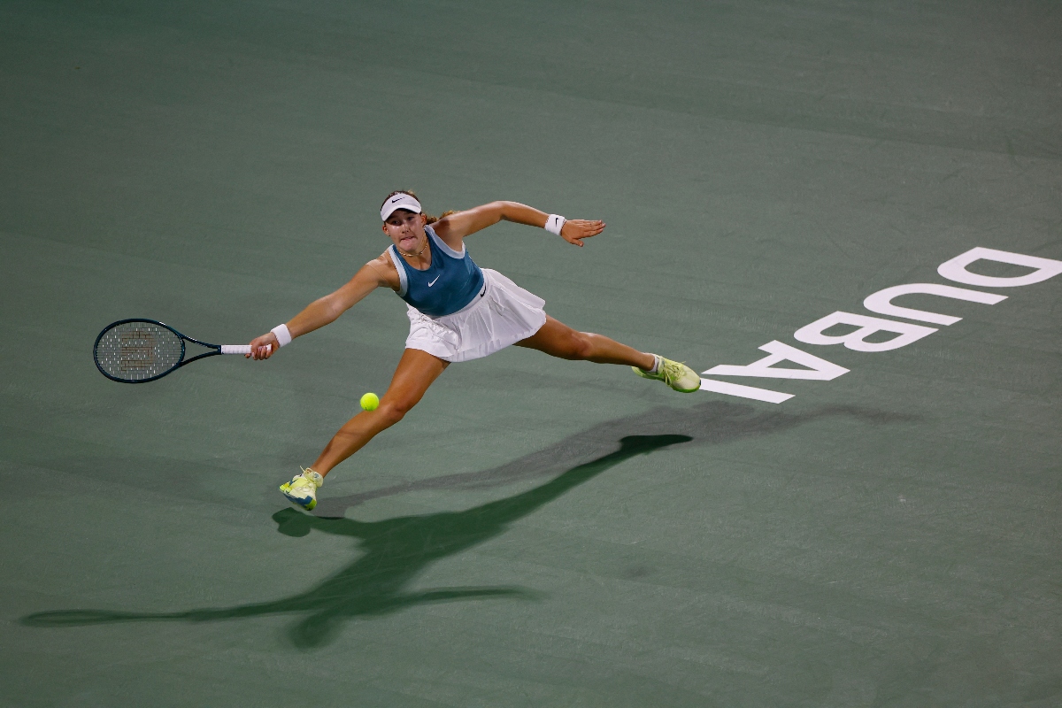 Russia's Mirra Andreeva in action during her semifinal match against Kazakhstan's Elena Rybakina at the Dubai Championships Friday. (Reuters)