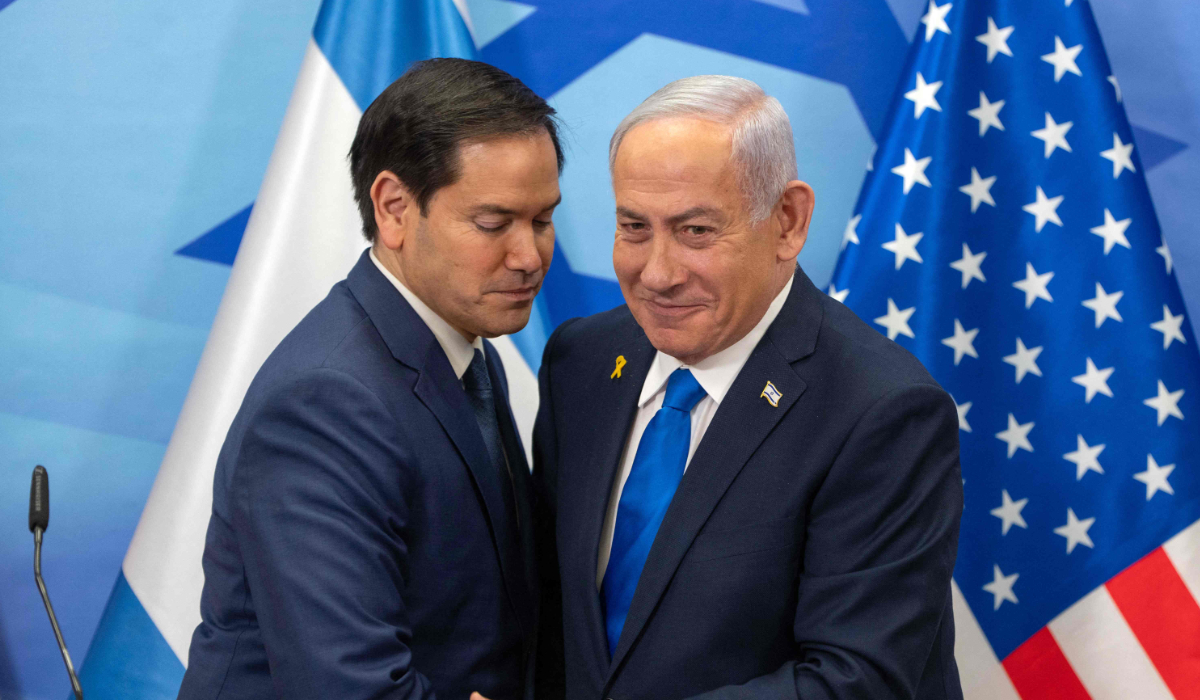 US Secretary of State Marco Rubio (L) and Israeli Prime Minister Benjamin Netanyahu greet each other during a joint press conference at the prime minister's office in Jerusalem on February 16, 2025. (AFP)