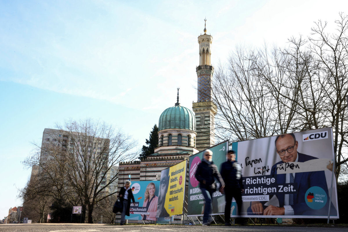 Above, a campaign poster for Friedrich Merz, Christian Democratic Union party candidate for chancellor, is pictured in Berlin on Feb. 22, 2025, ahead of the parliamentary election. (Reuters)