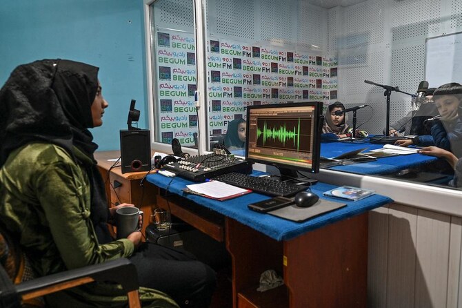 Students attend a class on-air at Radio Begum in Kabul on Nov. 28, 2021. (AFP)