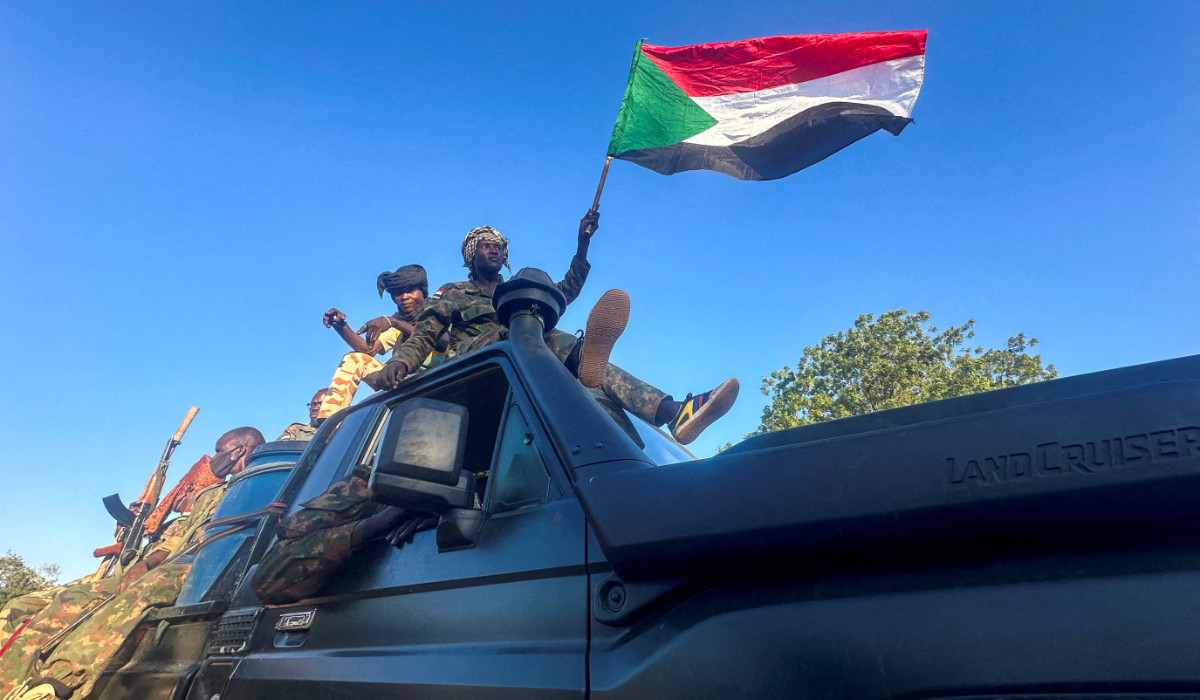 Sudan's army soldiers celebrate after entering Wad Madani, in Sudan, January 12, 2025. (REUTERS)