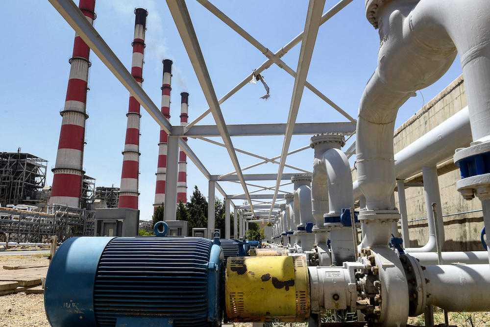 Above, a thermal natural gas and fuel-oil power plant serving Syria’s northern city of Aleppo on July 10, 2022. (AFP file photo)
