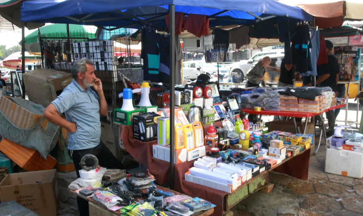 An Iraqi vendor waits for customers in Baghdad. (AP/File)