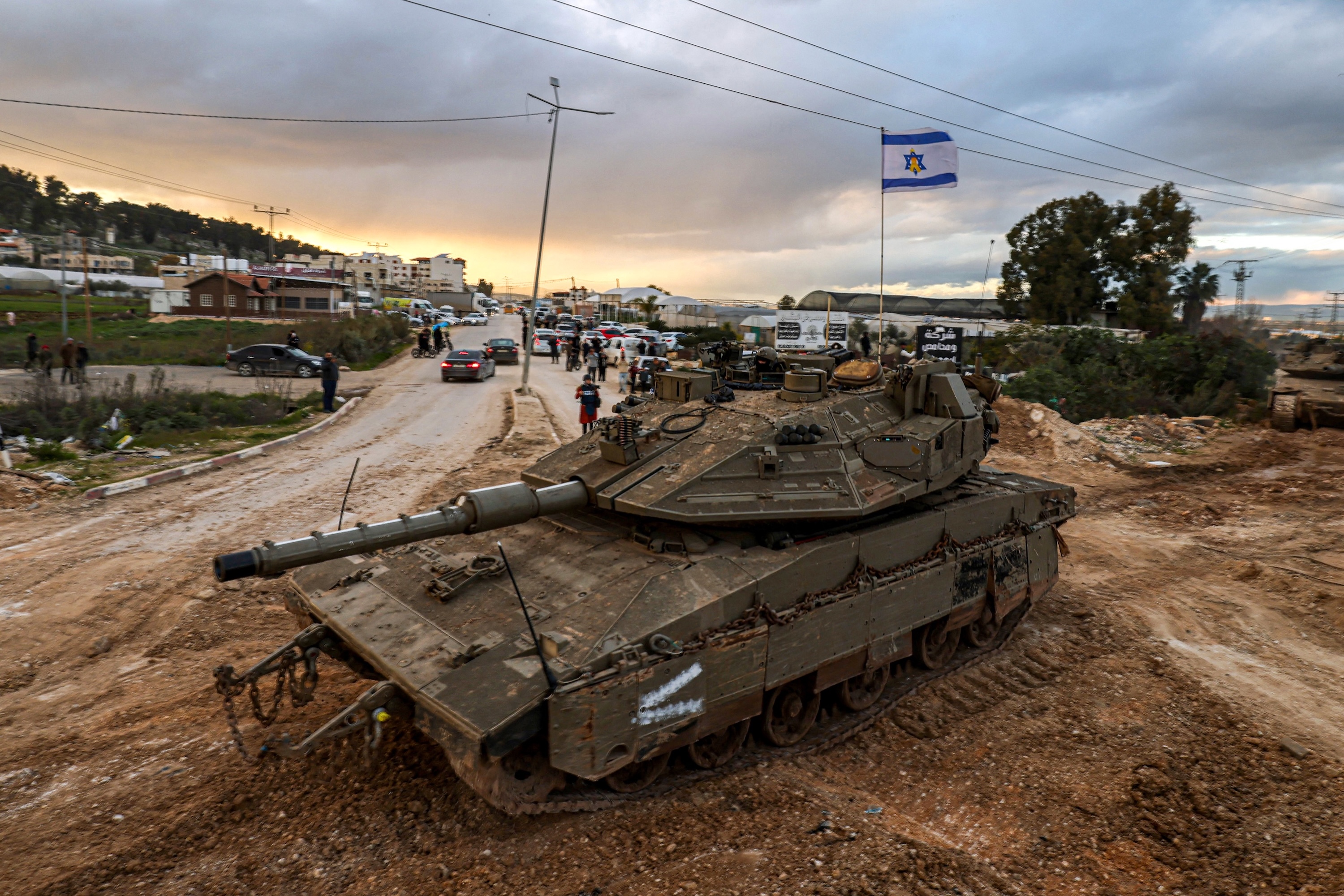 Israeli tanks enter the Jenin camp for Palestinian refugees in the occupied West Bank, Feb. 23, 2025. (AFP)
