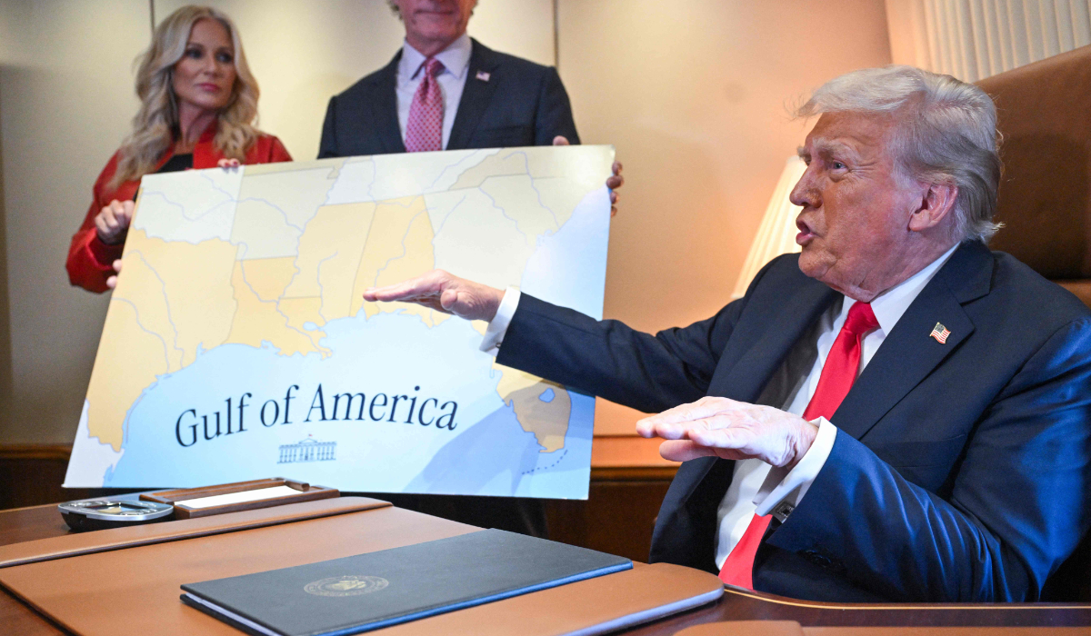 US President Donald Trump speaks to the press before signing a proclamation renaming the Gulf of Mexico as the Gulf of America aboard Air Force One, as it flies over the Gulf enroute to New Orleans, Louisiana on Febrary 09, 2025. (AFP)
