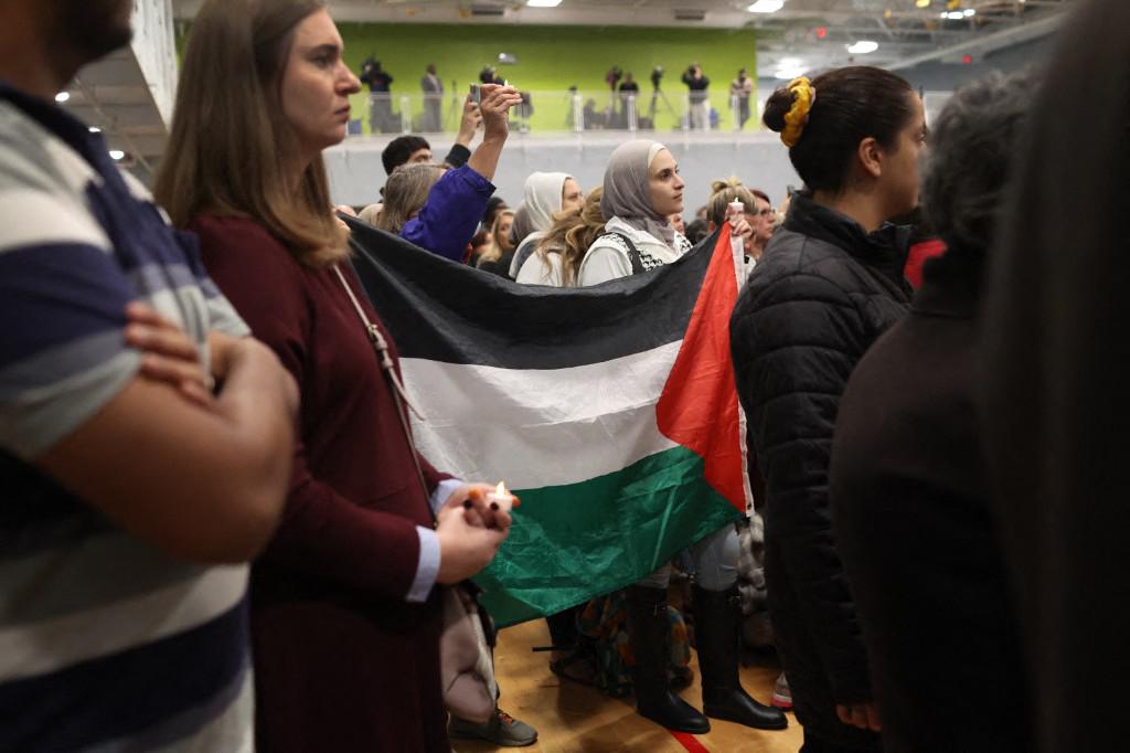Community members attend a vigil at the Prairie Activity and Rec Center for 6-year-old Palestinian-American Wadea Al-Fayoume on October 17, 2023 in Plainfield, Illinois. (AFP)