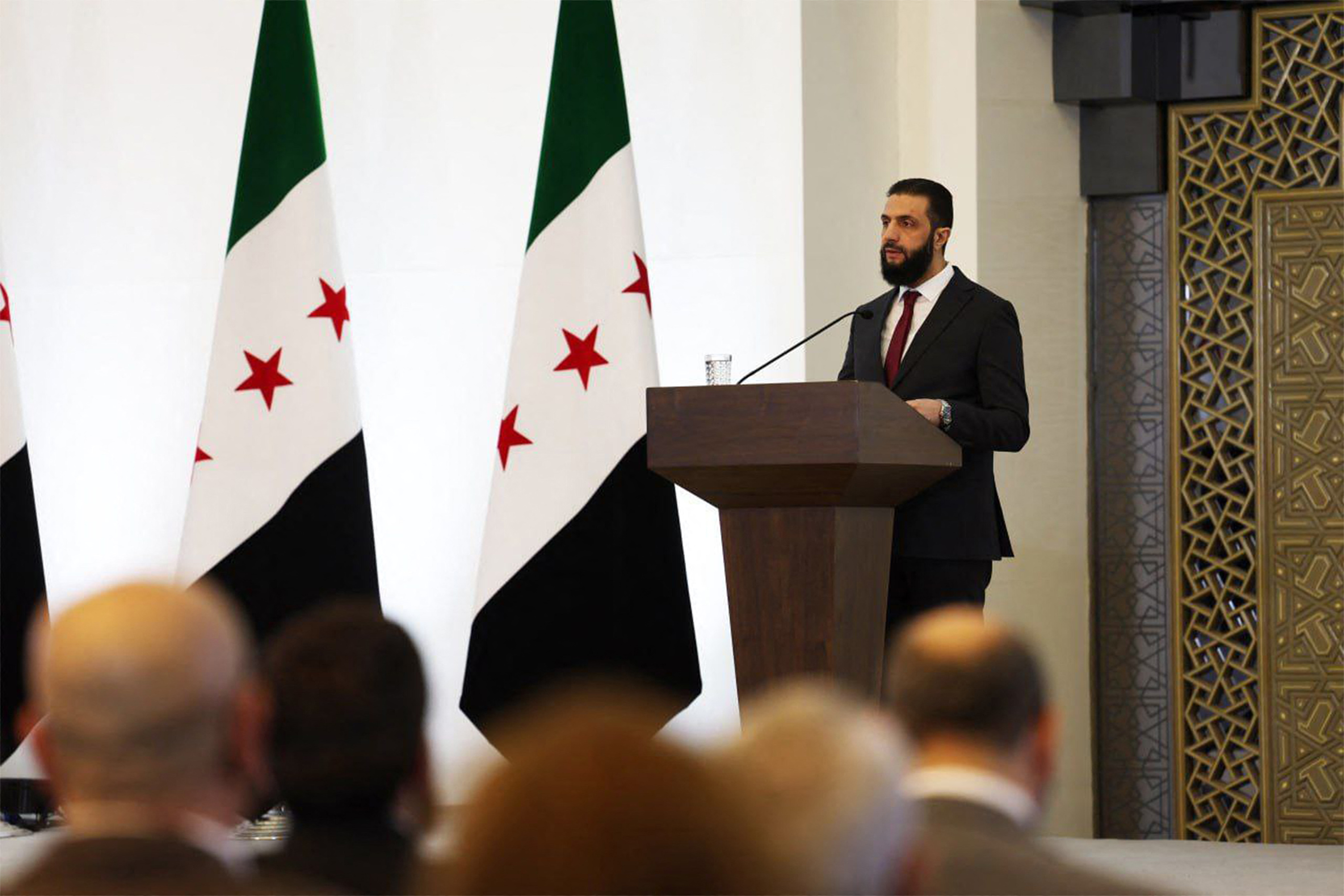 Syria's interim president Ahmed al-Sharaa addressing representatives and dignitaries of Syrian communities during the National Dialogue Conference in Damascus, Feb. 25, 2025. (AFP)