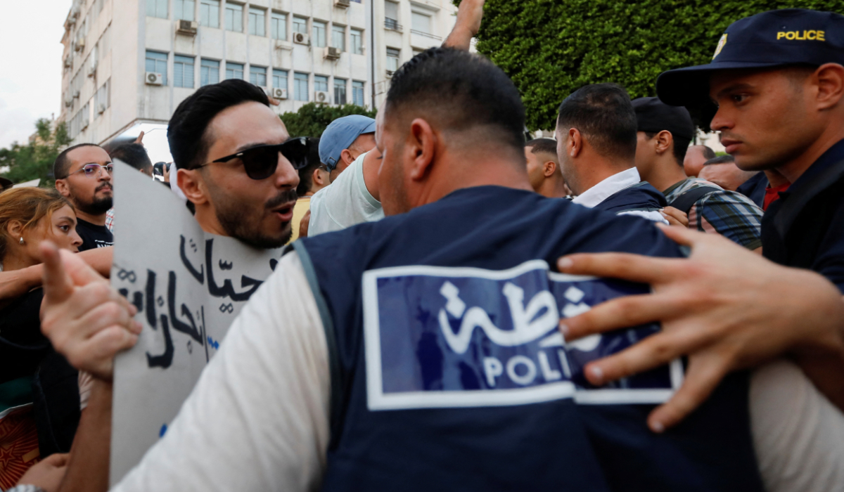 Demonstrators and police officers clash during a protest against Tunisia's President Kais Saied, two days before the presidential election, in Tunis, Tunisia October 4, 2024. (REUTERS)