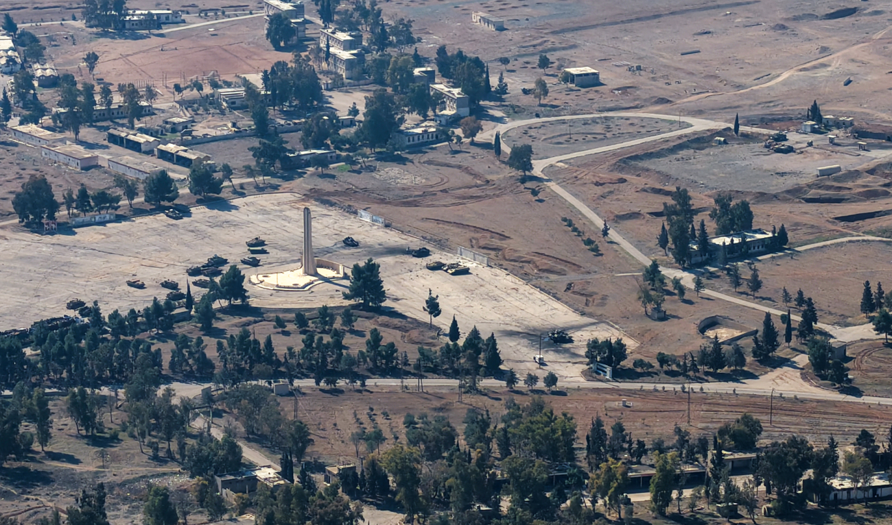 An aerial picture shows a view of a military site that was reportedly targeted in Israeli airstrikes a day earlier in the Syrian town of Al-Kiswah some 13Km south of Damascus on February 26, 2025. (AFP)