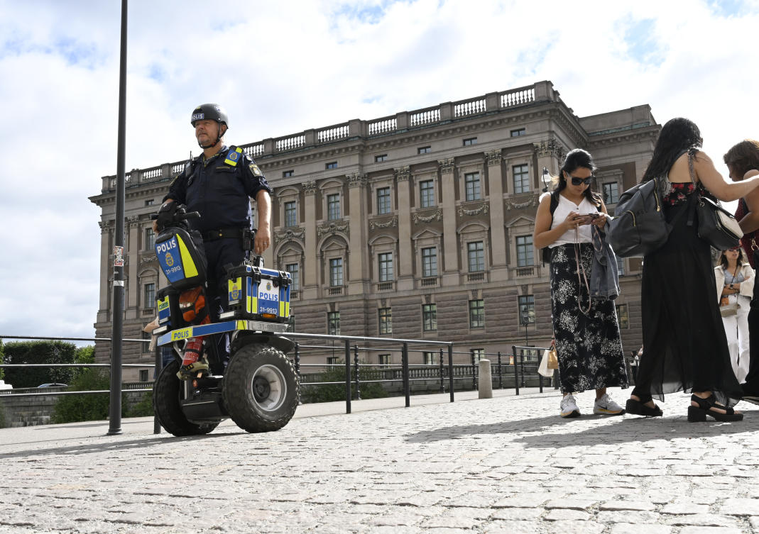 A police officer on a Segway patrols Sweden’s parliament in Stockholm, Aug. 17, 2023. (AP/File)
