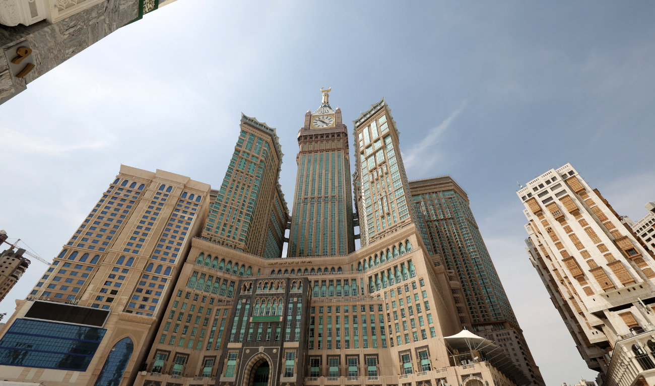 This picture shows the Abraj Al-Bait Towers, also known as the Mecca Royal Hotel Clock Tower, in the Saudi holy city of Mecca during the annual Hajj pilgrimage, on July 17, 2021. (AFP/file)