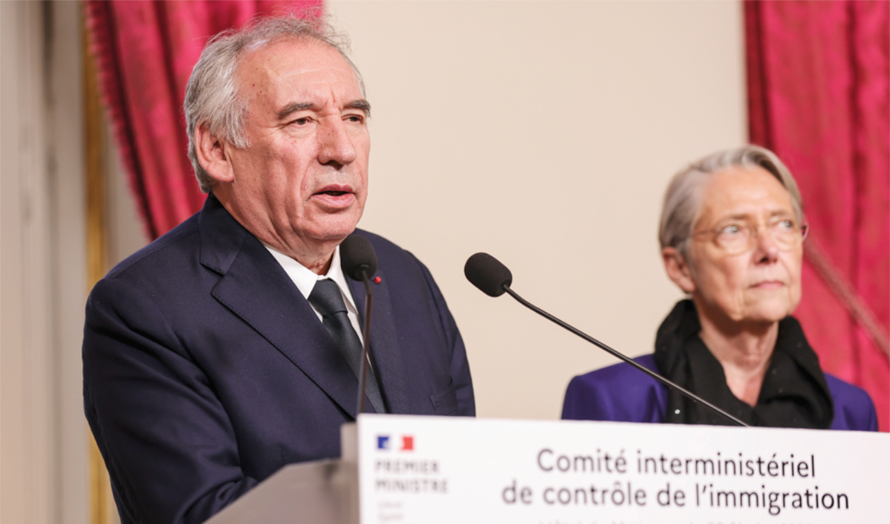 French Prime Minister Francois Bayrou, left, speaks in Paris. (AP)