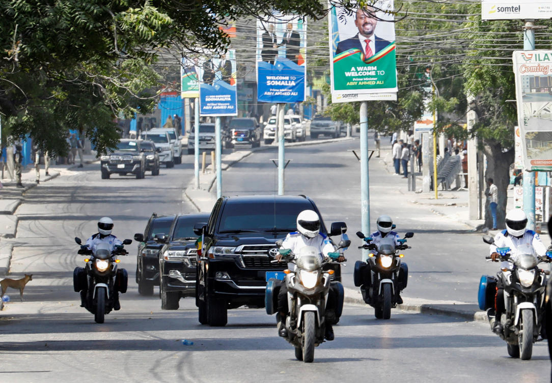 Ethiopia's Prime Minister Abiy Ahmed's convoy drives after he arrived to hold discussions with Somalia's President Hassan Sheikh Mohamud's during his visit in Mogadishu, Somalia. (Reuters)