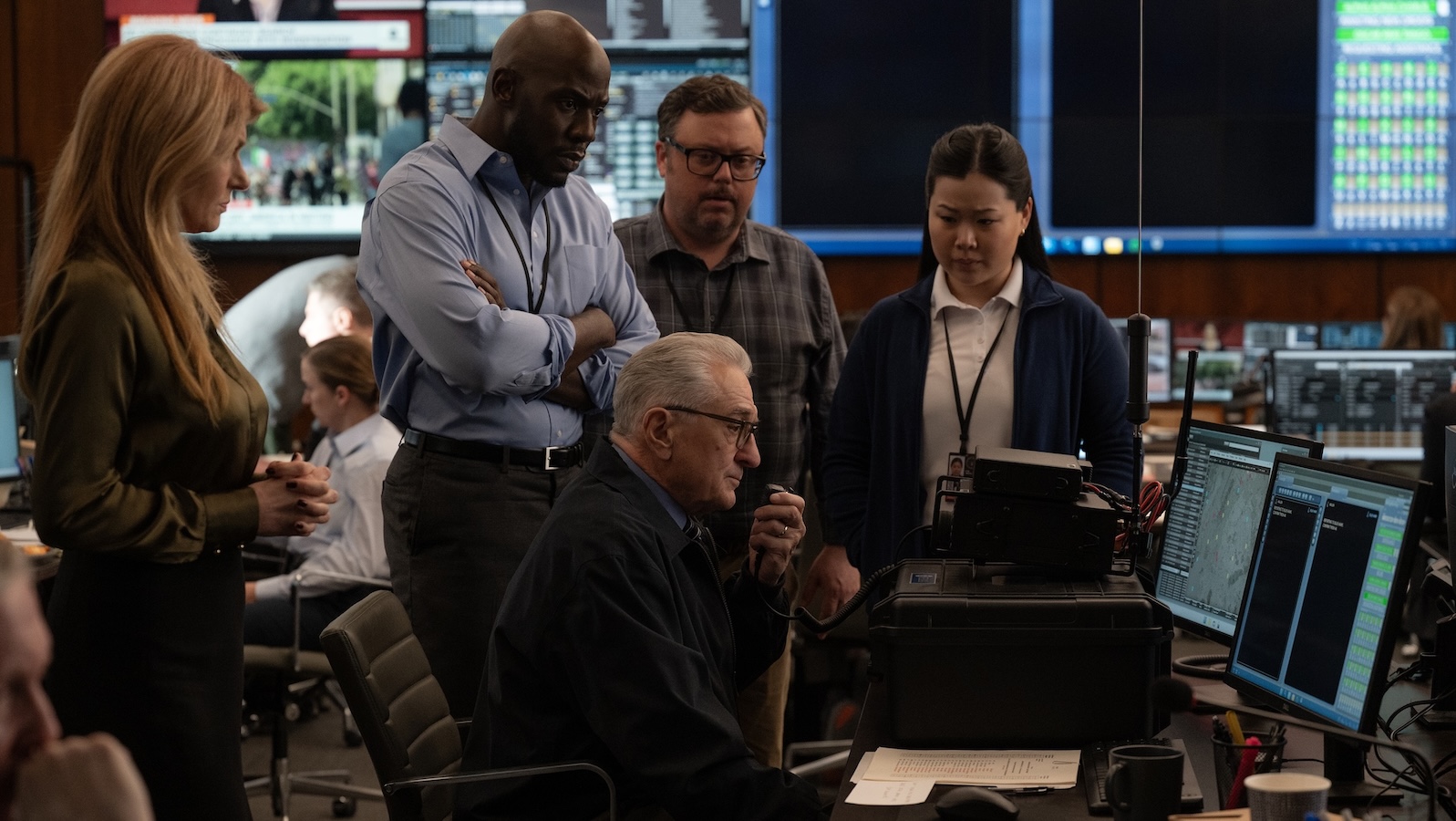 (L to R) Connie Britton as Valerie Whitesell, McKinley Belcher III as Carl Otieno, Robert De Niro as George Mullen, Jay Klaitz as Tim Pennington, and Eden Lee as Agent Angela Kim in 'Zero Day.' (Supplied)