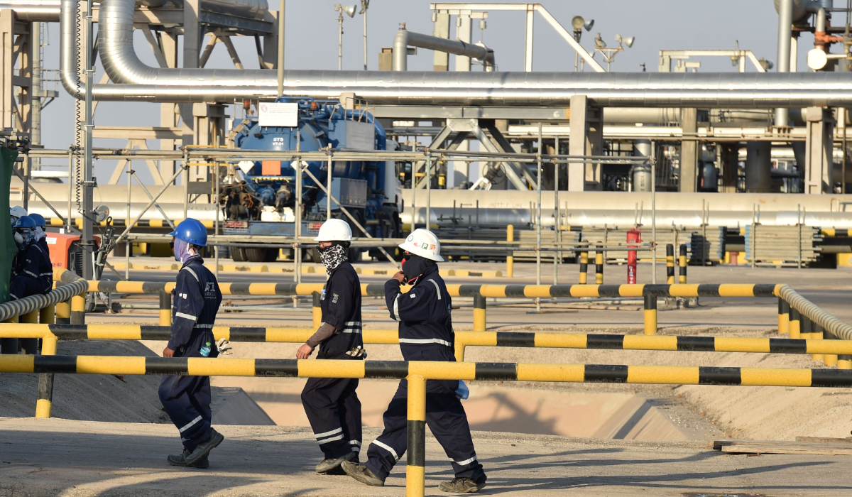 Employees of Aramco oil company working in Saudi Arabia's Abqaiq oil processing plant. (AFP)