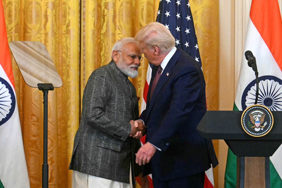 US President Donald Trump shakes hands with Indian Prime Minister Narendra Modi at the White House in Washington, DC.