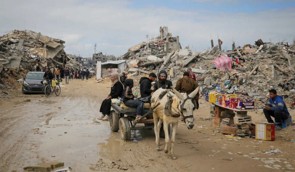 Palestinians riding a donkey cart in Gaza. (AP)