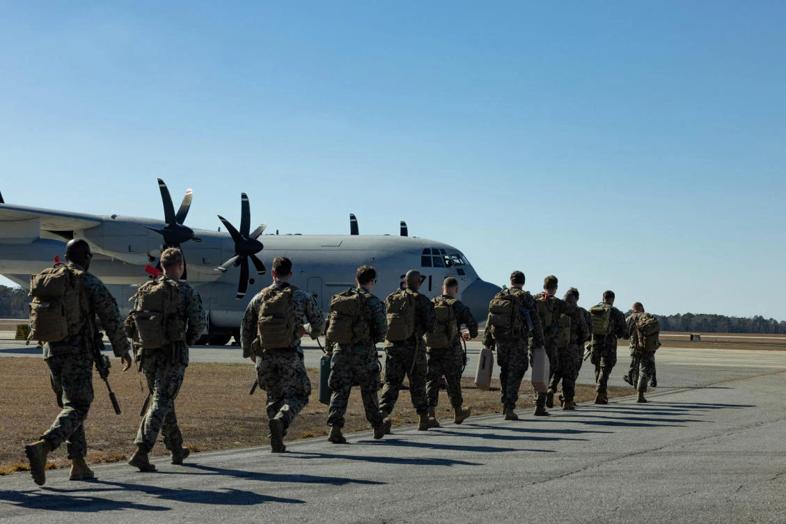 US flights carrying detained migrants to Guantanamo ‘underway’