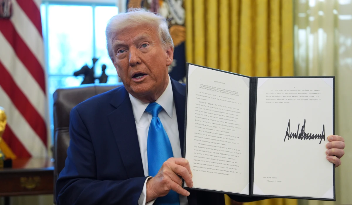 President Donald Trump holds an executive order regarding withdrawing from the United Nationals Human Rights Council in the Oval Office of the White House, Tuesday, Feb. 4, 2025, in Washington. (AP)